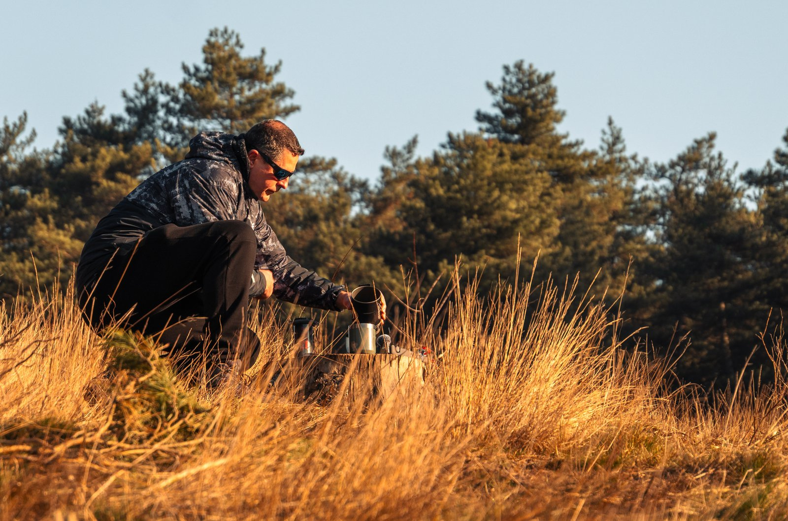 Libor Bednarik making coffee in Mechelse Heide, Belgium at sunrise