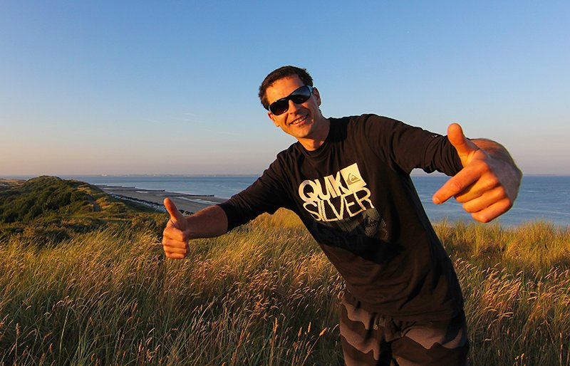 Libor Bednarik a photo of me on a dyke in Zeeland, Netherland. Camping trip. Photo by sunrise.